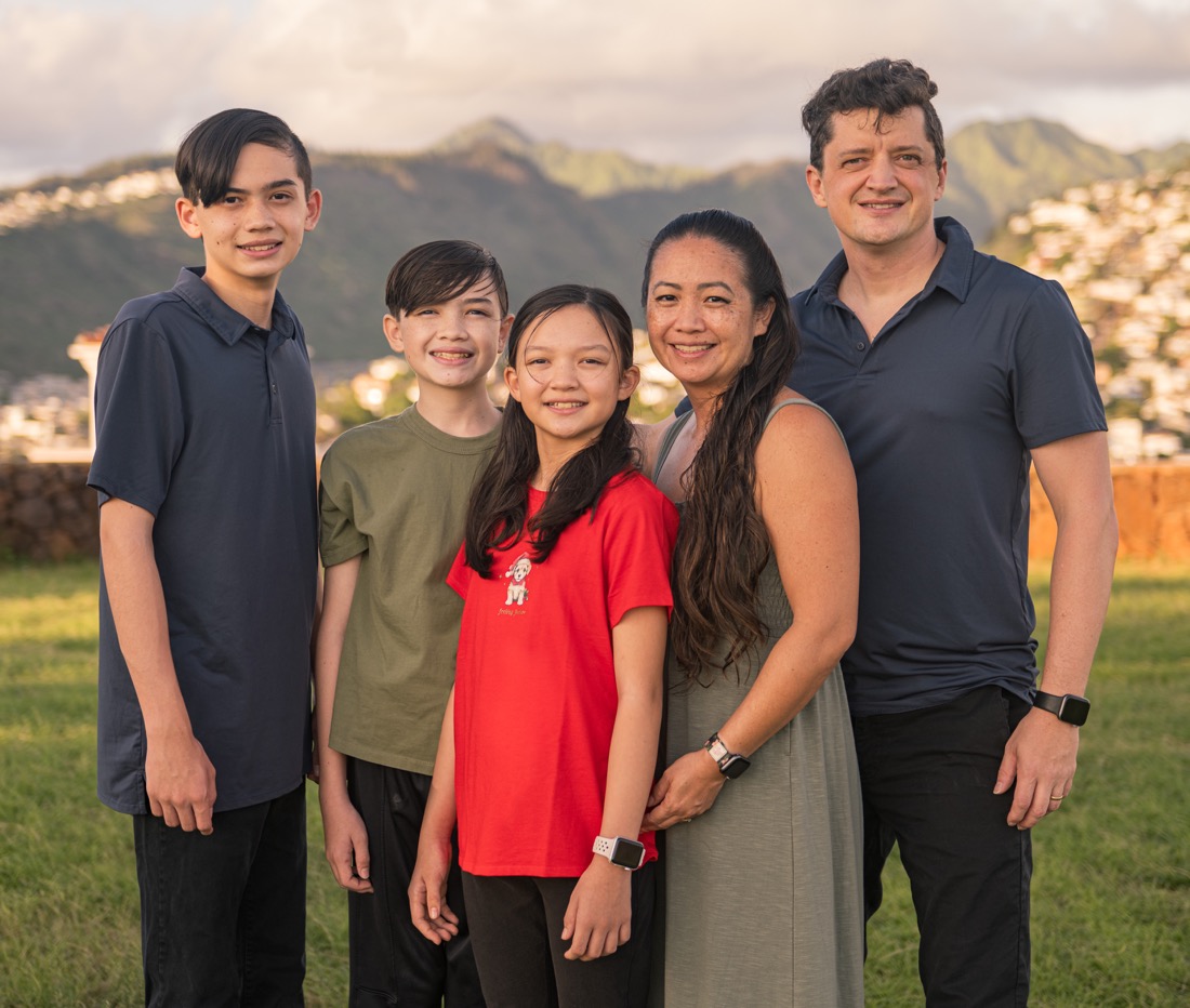 David Croswell standing with his family in East Honolulu
